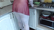 MILF Frina continues naked cooking. Todays menu is chicken. Sexy Milf in kitchen no panties in transparent negligee. Natural tits Pussy Beautifull ass